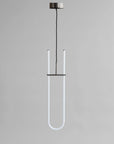 Modern pendant light with a U-shaped design on a gray background