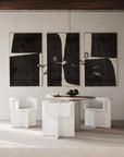 A Scandinavian theme dining room styled with bowl, wall art and a minimal design chandelier.