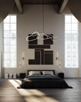 Modern bedroom with a bed, wall art, and large windows.