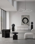 Modern interior design with white furniture and black accents
