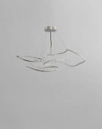Modern pendant light fixture on a gray background from 101 Copenhagen available at Spacio retail stores in Mumbai & Kolkata.