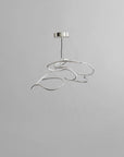 Modern pendant light fixture on a gray background