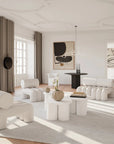 Modern living room with white furniture and neutral decor