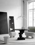 Modern interior design with black and white furniture in a bright room.