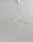 Gold hanger pendant light on a gray background from 101 Copenhagen available at Spacio retail stores in Mumbai & Kolkata.