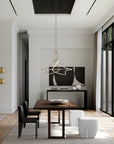 Modern dining room with wooden table, chairs, and a television in a well-lit room.