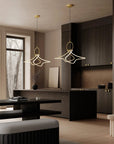 Modern interior with pendant lights, a bench, and a kitchen area.