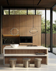 Modern kitchen with wooden cabinets and a large island.