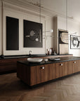 Modern living room with wooden console table, black countertop, and wall art.