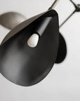 Modern black pendant light on a white background