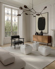 Modern living room with minimal furniture and decor.