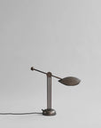 Vintage-style table lamp on a plain background