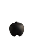 Black ceramic vase on a white background from 101 Copenhagen at Spacio retail stores in Mumbai & Kolkata.