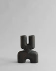 An organic-shaped 101Cph Cobra Double Mini Coffee 212002 vase displayed in an interior setting.