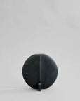 A quirky 101Cph Guggenheim Petit Black 213042 by 101 Copenhagen sitting on a white surface.
