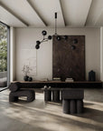 Modern living room with black furniture and decor