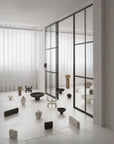 Modern interior with ceramic sculptures on a white floor and walls from 101 Copenhagen at Spacio retail stores in Mumbai & Kolkata.