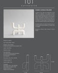 Cobra candle holder by 101 Copenhagen with product details on a gray background