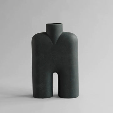 A 101Cph Cobra Tall Medio Black 212007 vase on a white background. This quirky 101 Copenhagen vase is perfect for adding a touch of drama to any space.