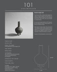 A black and white image of a 101Cph Duck Fat Dark Grey 111281 vase with a dark grey color.