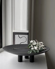 A 101Cph Duck Plate Big Coffee 214049 by 101 Copenhagen sits on top of a window sill in a Scandinavian home.