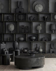 A room with many 101Cph Duck Slim Coffee 111280 vases and a coffee table.