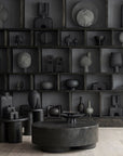 A room with many 101Cph Duck Slim Coffee 111280 vases and a coffee table.