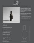 A ceramic black vase with the 101 Copenhagen Duck Slim Coffee 111280 on it.