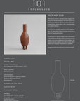 A brochure featuring a captivating picture of the 101Cph Duck Vase Slim Terracotta 213044, showcasing the artistic influence of the Cobra Arts Movement by 101 Copenhagen.