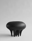 A 101Cph Medusa Vase Big Coffee 221061 by 101 Copenhagen sitting on top of a white surface.