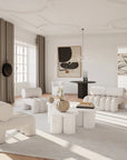 Modern living room with white furniture and neutral decor