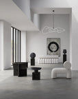 Modern interior with black and white furniture and abstract art from 101 Copenhagen