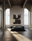 Modern bedroom with large windows, wooden floor, and abstract wall art.