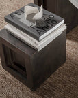 Stack of coffee table books on a small coffee colour pedestal (plinth) from 101 Copenhagen at Spacio retail stores in Mumbai & Kolkata.