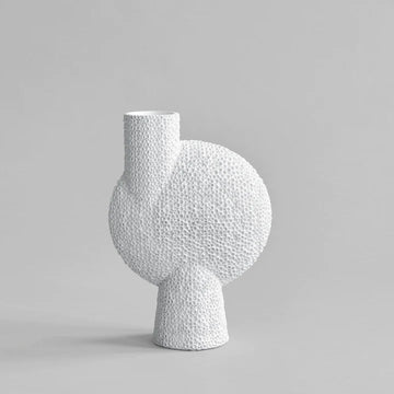 A decorative 101Cph Sphere Bubl Shisen Big B White 231013 vase on a grey background with a Bone White finish.