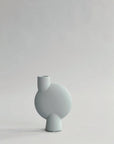 A small grey 101Cph Sphere Vase Bubl Medio Mint 221038 (Limited Edition) from the Sphere collection by the Scandinavian brand, 101 Copenhagen, on a white background.