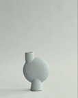 A small grey 101Cph Sphere Vase Bubl Medio Mint 221038 (Limited Edition) from the Sphere collection by the Scandinavian brand, 101 Copenhagen, on a white background.