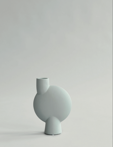 A small grey 101Cph Sphere Vase Bubl Medio Mint 221038 (Limited Edition) from the Sphere collection by the Scandinavian brand, 101 Copenhagen, on a white background.