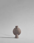 Minimalist ceramic vase on a plain background from 101 Copenhagen at Spacio retail stores in Mumbai & Kolkata.