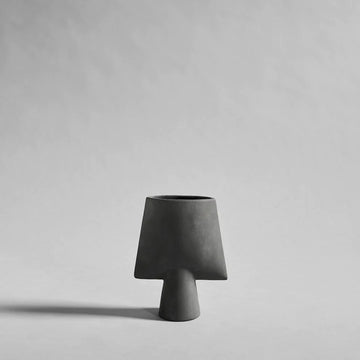 A Scandinavian brand's 101Cph Sphere Vase Square Mini Dark Grey 111020 from the 101 Copenhagen collection on a white background.