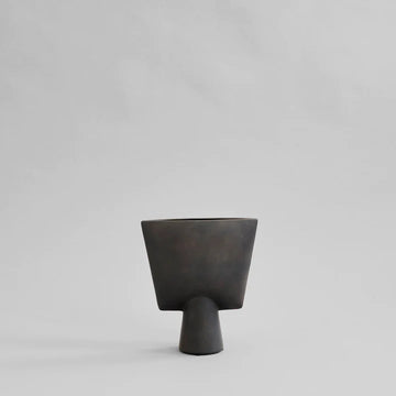 A 101Cph Sphere Vase Triangle Mini Coffee 213025 by 101 Copenhagen on a white background exudes elegance.