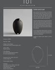 Ceramic vase with product details on a gray background