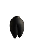 Black abstract vase on a white background from 101 Copenhagen at Spacio retail stores in Mumbai & Kolkata.