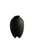 Black vase on a white background from 101 Copenhagen at Spacio retail stores in Mumbai & Kolkata.