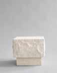 Rectangular limestone plinth on a gray background from 101 Copenhagen at Spacio retail stores in Mumbai & Kolkata.