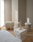 Modern interior with limestone plints furniture and light wood flooring