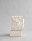 Tall limestone plinth from 101 Copenhagen at Spacio retail stores in Mumbai & Kolkata.