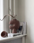 Styling of a window corner with Books and Tribal Collection from 101 Copenhagen. Available at Spacio India