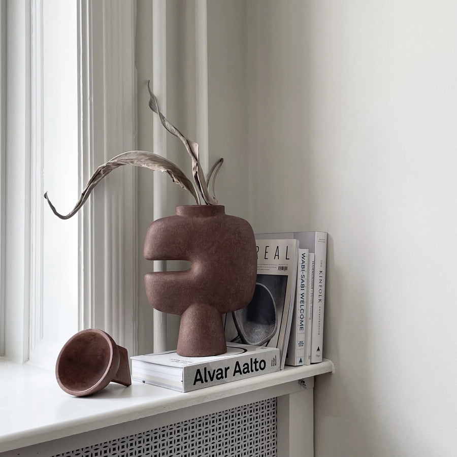 Styling of a window corner with Books and Tribal Collection from 101 Copenhagen. Available at Spacio India