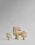 A set of three 101Cph Tribal Vase Mini Sand 221002 by 101 Copenhagen on a grey background. Available at Spacio India